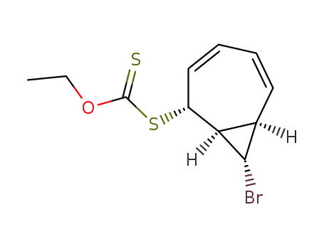 Dithiocarbonic acid S-((1R,2R,7R,8S)-8-bromo-bicyclo[5.1.0]octa-3,5-dien-2-yl) ester O-ethyl ester