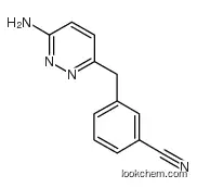 3-[(6-aminopyridazin-3-yl)methyl]benzonitrile