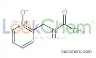 N-[(1-oxidopyridin-1-ium-2-yl)methyl]acetamide