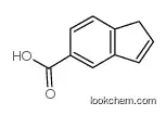 1H-indene-5-carboxylic acid